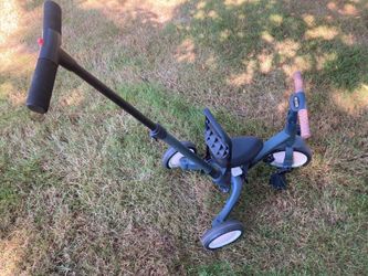Tricycle with steering handle