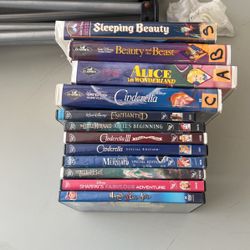 Disney DVDs and VHS movies 12 of them. Cinderella, sleeping beauty, Alice in wonderland, beauty and the beast, and chanted little mermaid 