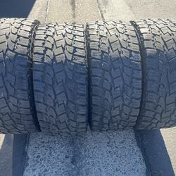 (4) 33x12.50R18 Toyo All Terrain 