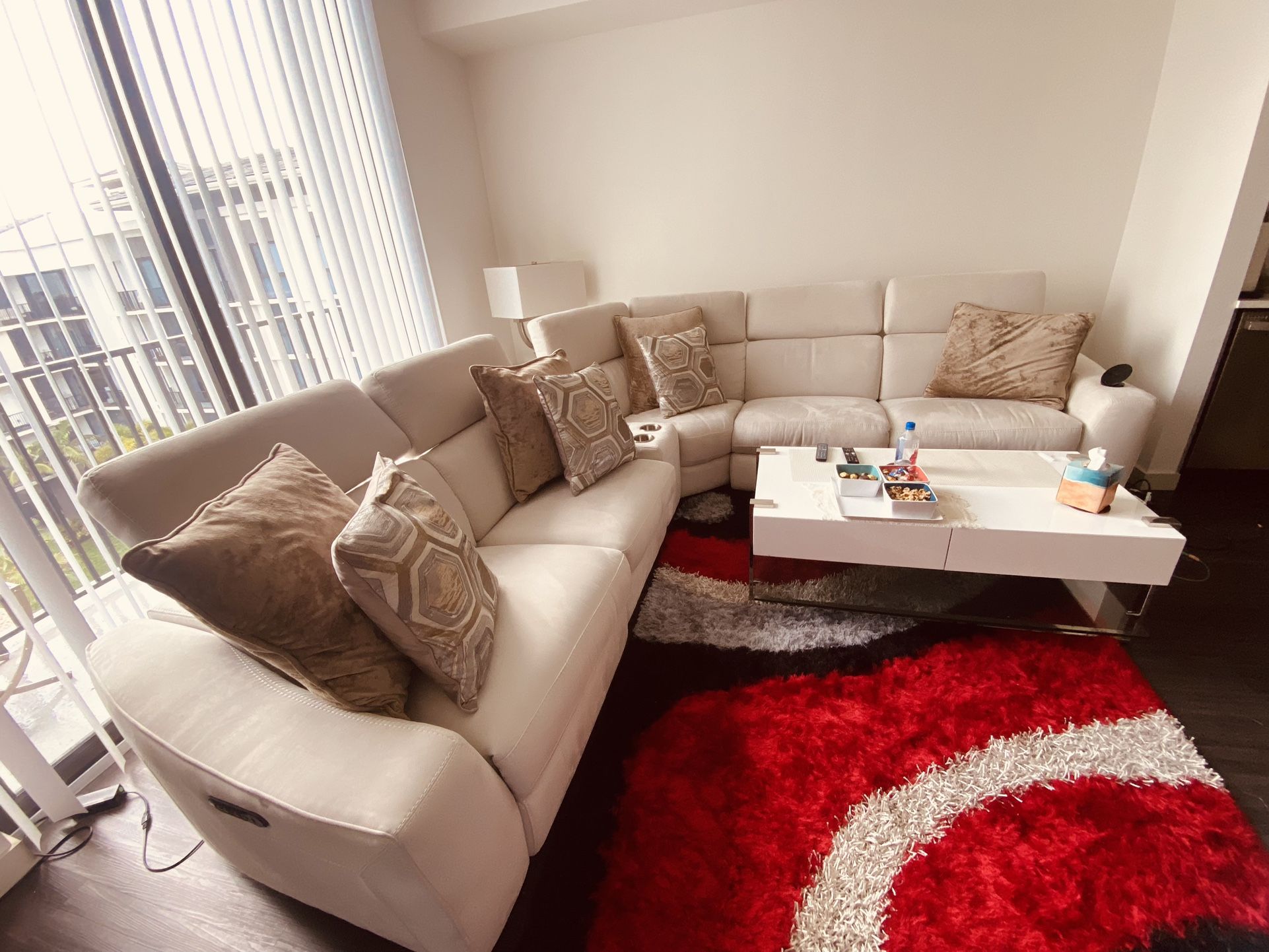 Beige Sectional + White Coffee Table
