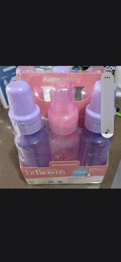 Brand new 6 large Dr. Browns baby bottles.  ( never used never open still sealed ).