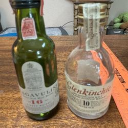 Miniature empty liquor bottles. Vintage.
