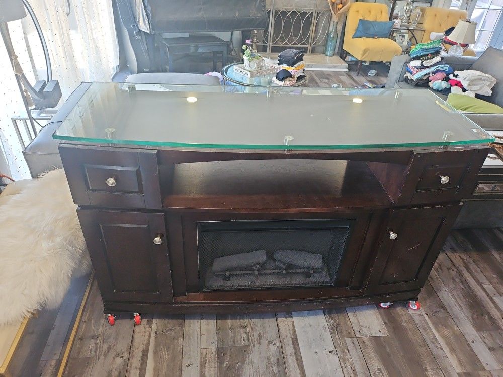 TV Console with Electric fireplace.