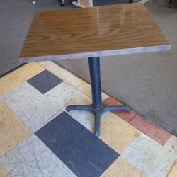 A 3-foot Square Pedestal Table
