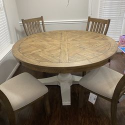 Grindleburg Round Dining Set by Ashley Furniture