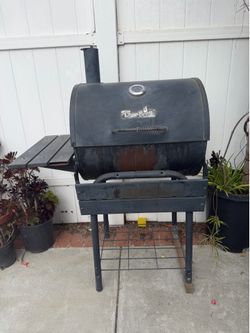 Barbecue grill used , needs cleaning  still  strong