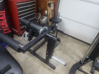 Leg curl and extension machine