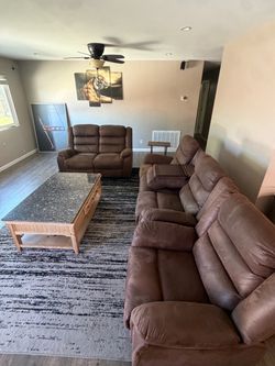 Brown Reclining Sofa and Loveseat Set and Recliner