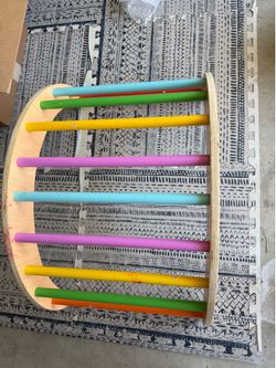 Kid’s climbing rainbow gym piece