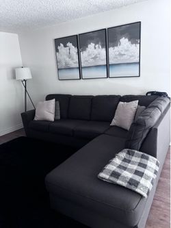 Dark grey sectional couch