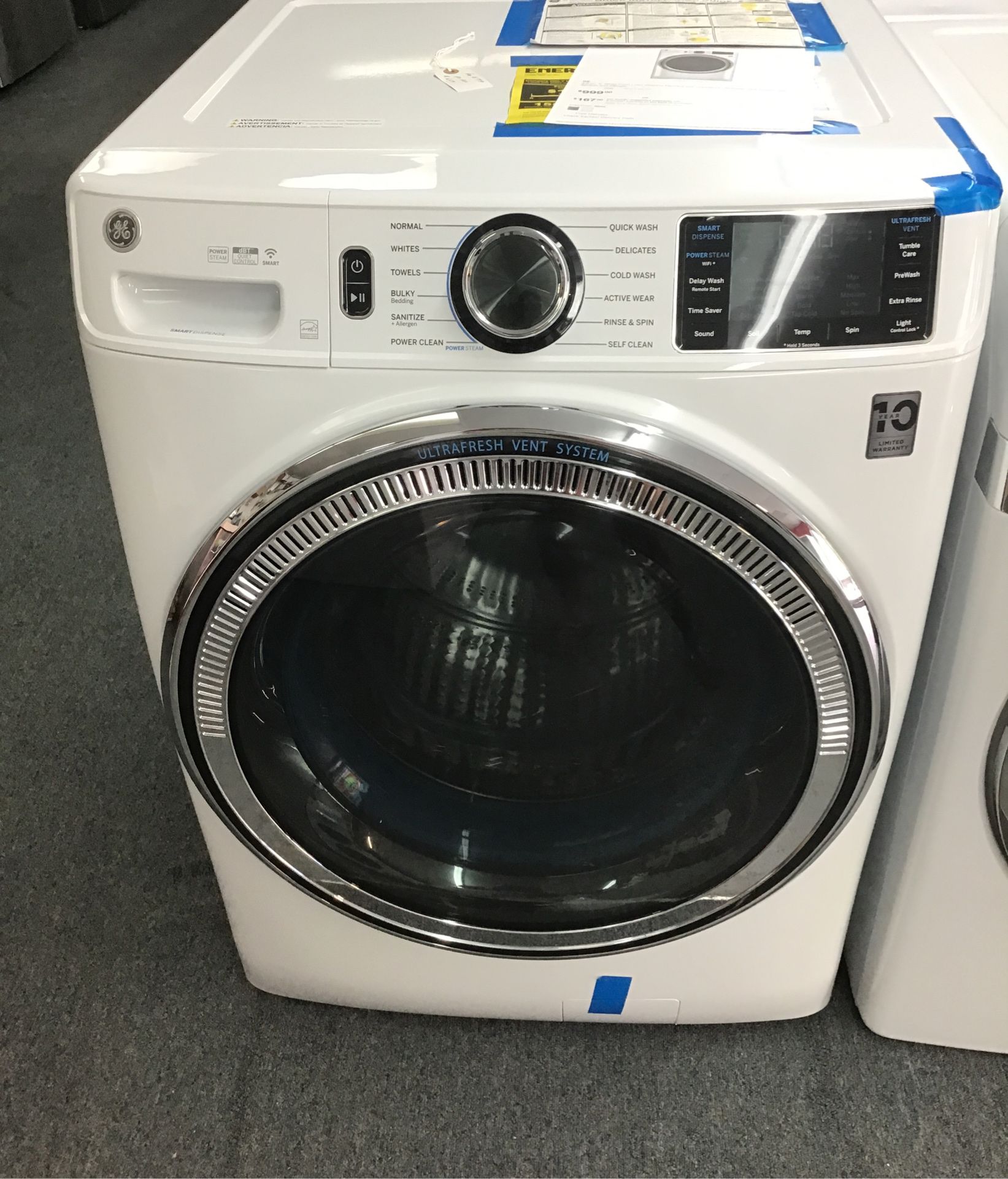 New scratch and dent GE 4.8 cu ft front load washer. 1 year warranty