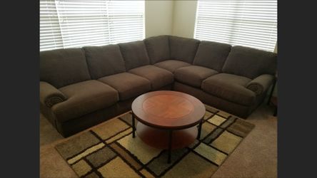 Set of 3 round tables. 2 side 1 center.