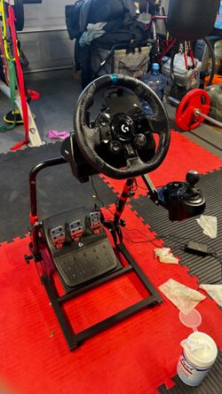 Price negotiable throw offers Logitech G923 steering wheel with shifter and foldable racing mount