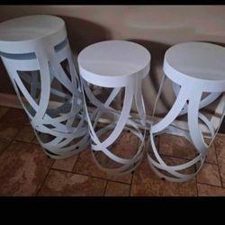 4 White Metal Counter Stools (Sold Together)?