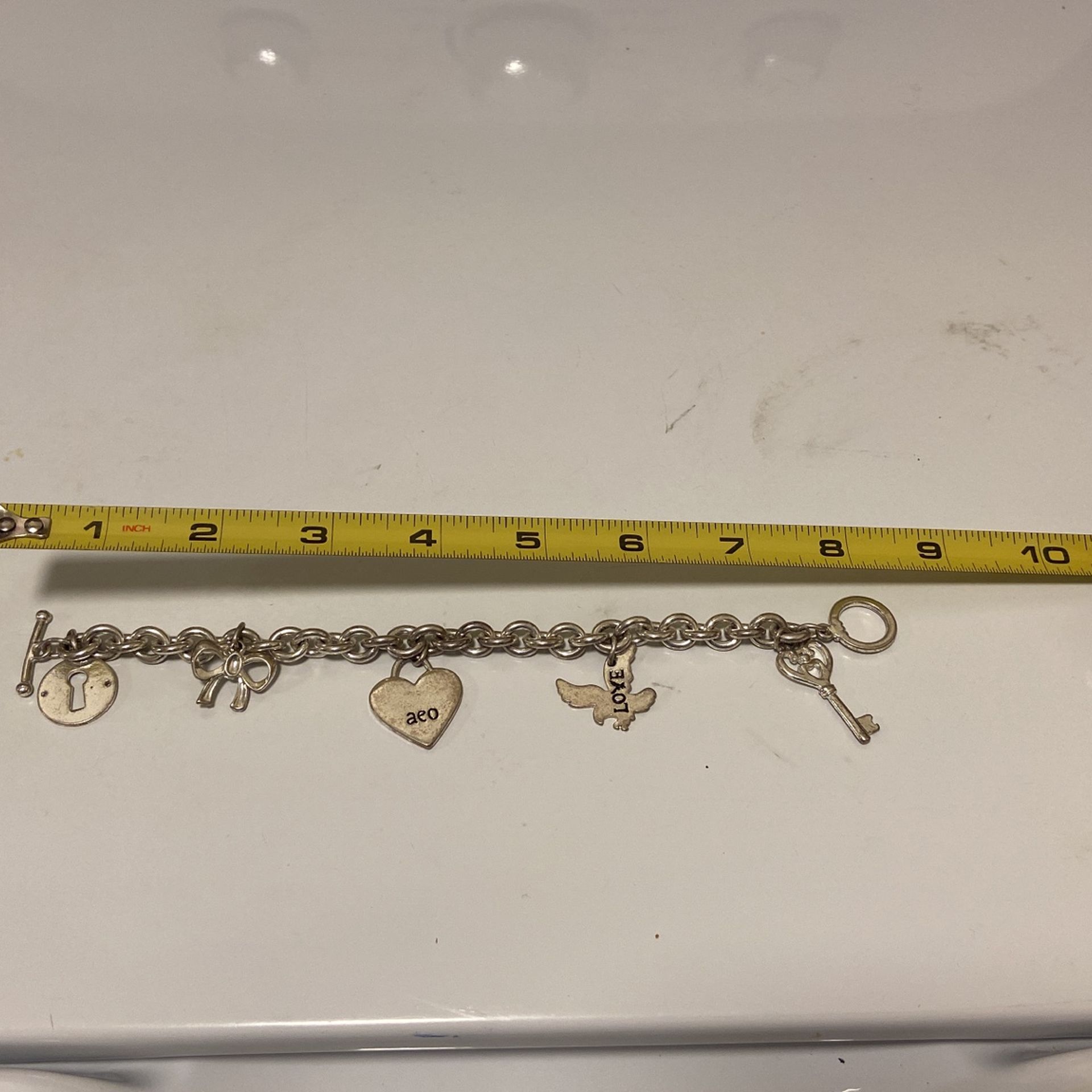 American Eagle Outfitters Charm Toggle Bracelet Silver Tone Metal 