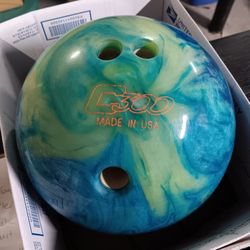Pre-drilled Columbia 300 bowling ball has a blue and green swirl pattern. 23mile and Card Macomb Township Michigan