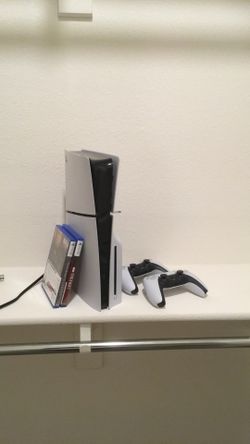 PlayStation 5 Slim Console + 2 DualSense Wireless Controllers