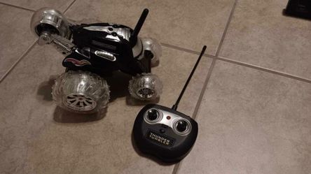LIKE NEW THUNDER TUMBLER RC RACER REMOTE CONTROL CAR SPINNING 360