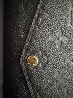 black Louis Vuitton wallet