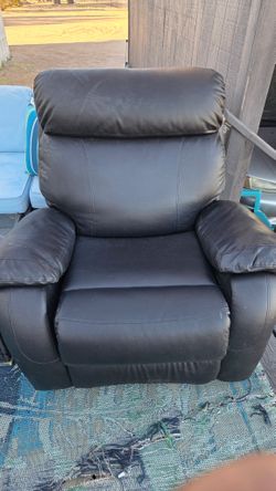 Black Leather Lounge Chair $100 Obo..