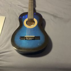 Blue beginner guitar 