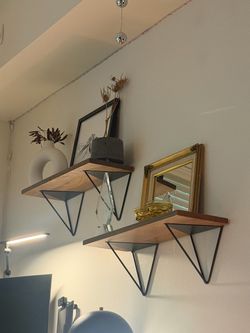 West Elm wooden shelves with custom Etsy mounts