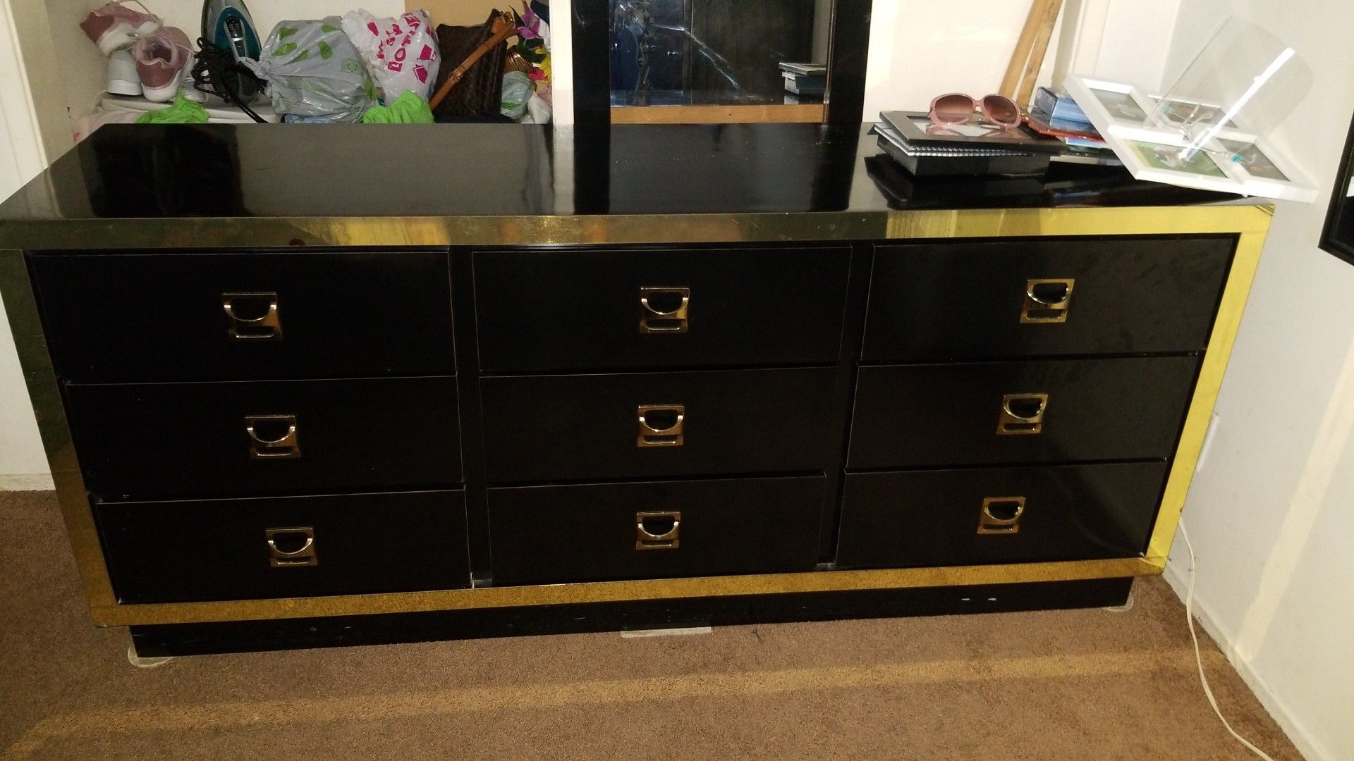 Black and gold dresser