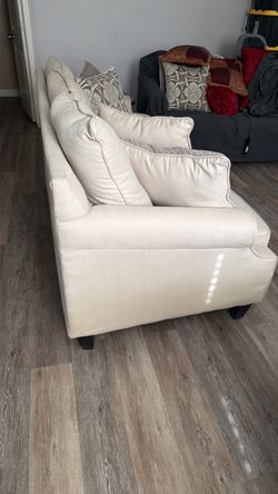 Two white couches
