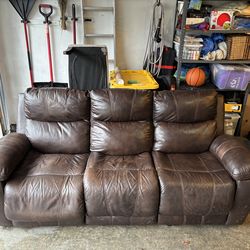 Faux leather couch - RECLINER DOESNT WORK