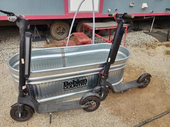 2 Electric Scooters With Extra Battery Packs Panasonic