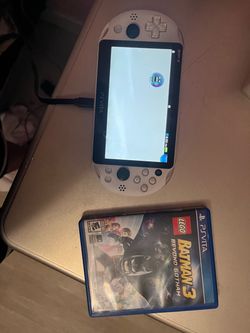 Ps vita 2000 white or for trade for video games