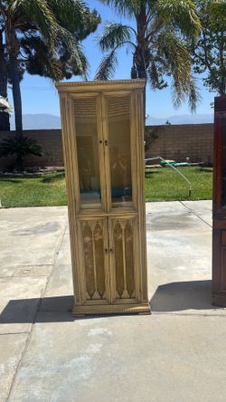 Tall curio cabinet