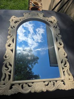 Ornemental framed mirror