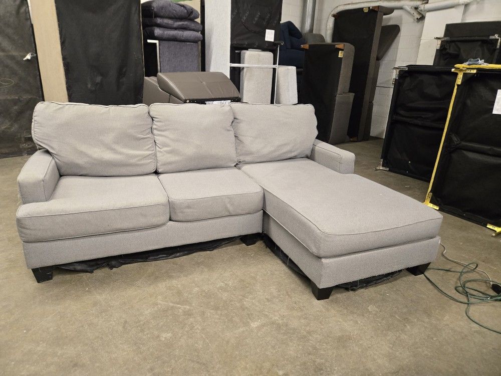 *Same Day Delivery Available!*
Grey Chaise Two Piece Sectional