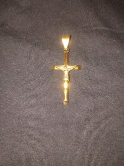 Gold Cross with Jesus on it