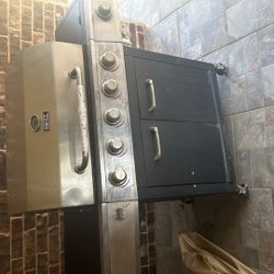 Backyard Grill With 2 Propane Cylinders