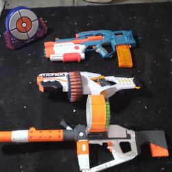 Nerf motorized dart guns, clips, drum clip, darts, and shooting target