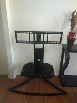 TV stand used...it holds good ...it comes with the screws