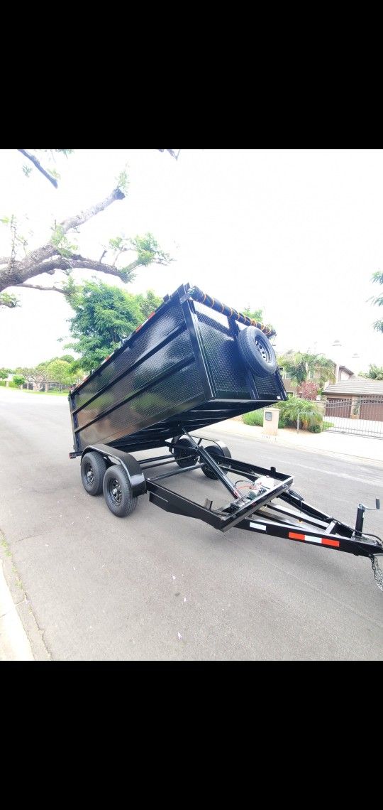 BRAND NEW DUMP TRAILER 8X12X4 12,000 LBS ROLLING TARP AND SPARE TIRE HYDRAULIC SYSTEM ELECTRIC BRAKES TITLE IN HAND FOR ANY QUESTION TEXT ME PLEASE