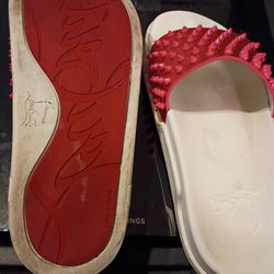 CHRISTIAN    LOUBOUTIN.  " DONNA SPIKED RUBBER SLIDES". EUROPEAN SIZE 39