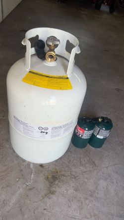 Propane tank and few smalller bottles about half full