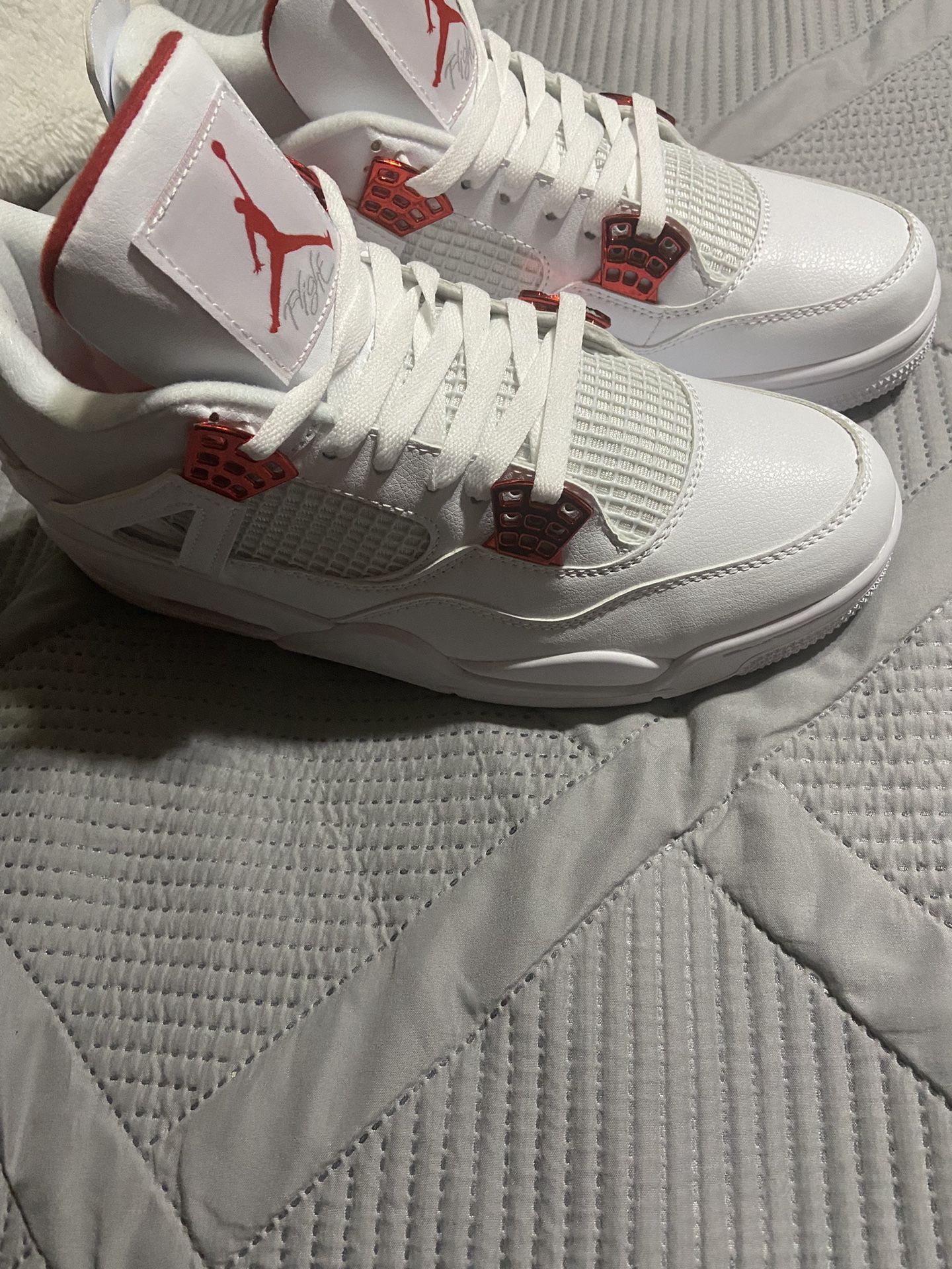 Jordan 4s Metallic Red