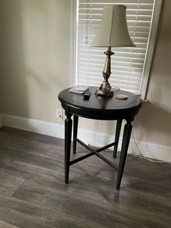 Round MahoganyTable by South Cone Trading Co.