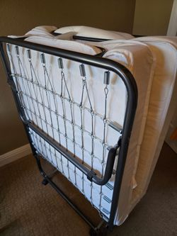 Twin size folding, rollaway cot