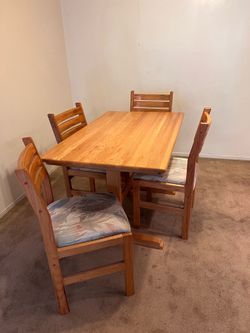 Four piece dining table
