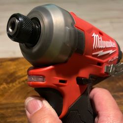Milwaukee M-12   FUEL  Surge Impact Driver , 1/4  New
