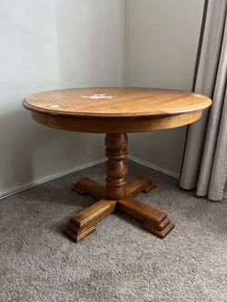 Round Wood Extendable Dining Table