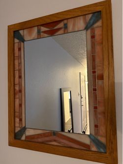 Vintage southwestern-style stained glass and oak framed mirror