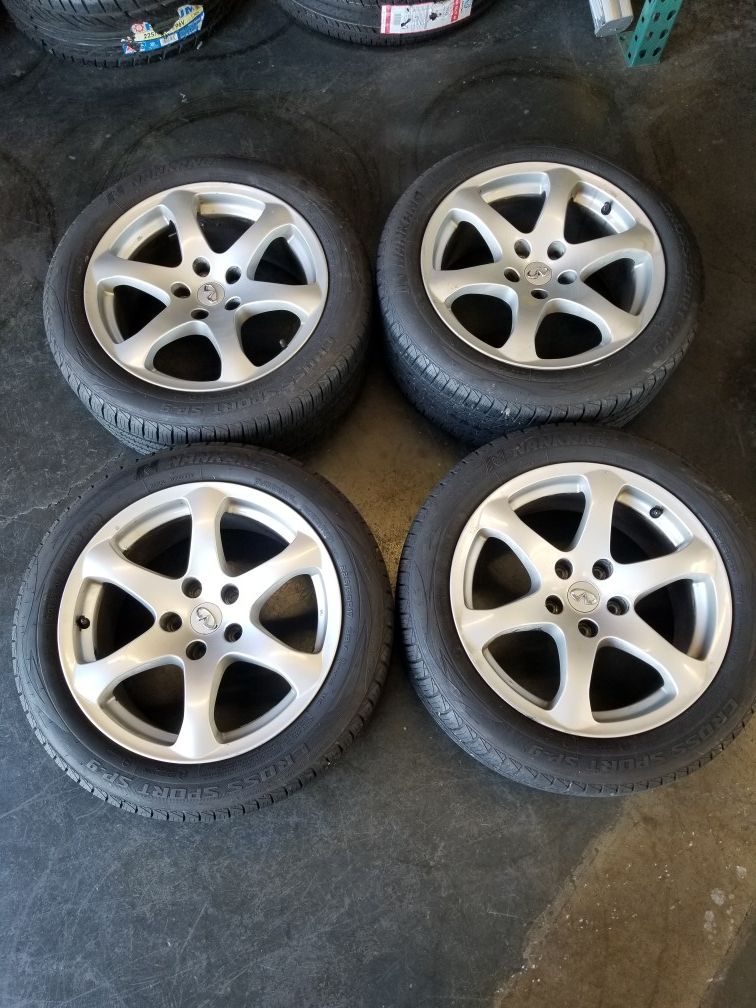 4 used 17" original stock infiniti g37 rims with almost new tires. 5×114.3. 225 50 17 nankang tires. Great condition.