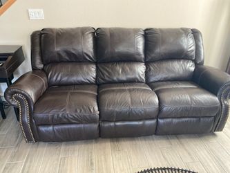 Two leather sofa piece and one micro fiber
